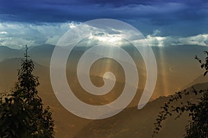 Sun shine from Cloud burst - Sikkim , India photo