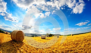 The sun shining upon rural landscape