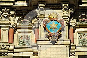 Sun symbol on the building wall