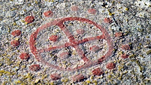 Sun symbol rock carving