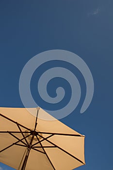 Sun umbrella and blue sky