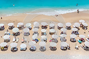 Sun Umbrellas and sun chairs on the beach, Meditterenian sea, Turkey
