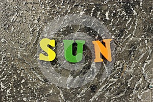 Sun word made of bright colored letters