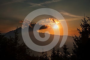 Sunaet with clouds with mount Pilatus. Copy space