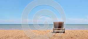 Sunbath chair on the beach with clearly blue sky background. Relax and vacation concept. object theme