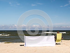 Sunbather at the beach photo