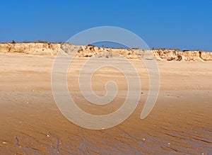 Sunbathers On Beach On Ilha De Barreta Portugal