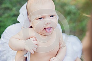 sunbathing baby. Child Taking a Sunbath.