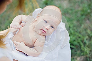 sunbathing baby. Child Taking a Sunbath.