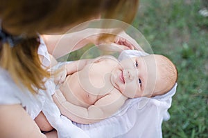 sunbathing baby. Child Taking a Sunbath.