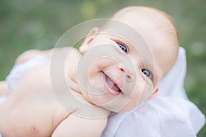 sunbathing baby. Child Taking a Sunbath.