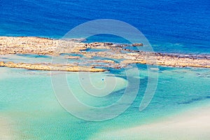 Sunbathing people in lagoon of Balos. Crete. Greece.