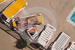 Sunbathing Poolside