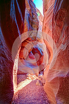 Sunbeam at the bottom of the canyon. Narrow slot canyon Wire Pass leading into Buckskin Gulch, Paria Canyon-Vermilion Cliffs Wilde