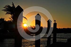 Sunbeams extend over treelined background in Marathon Key bay photo
