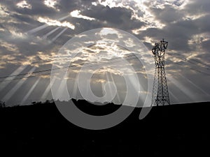 Sunbeams and pylon