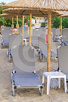 Sunbed on beach background front view