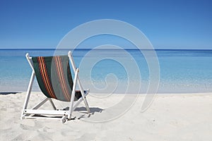 Sunbed on the caribbean beach photo