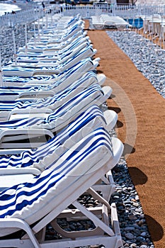 Sunbeds On Beachfront Of Nice