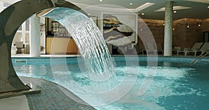 Sunbeds in the indoor swimming pool and shower pool. Move camera
