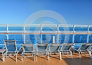 Sunbeds on open deck of cruise ship