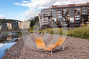 Sunbeds river path waterfront new apartments mixed-use urban multi-family residential district area development