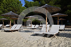Sunbeds socially distanced on Koukounaries beach, Skiathos