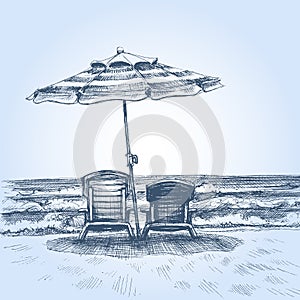 Sunbeds and umbrella on the beach