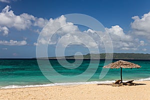 Sunbeds and umbrellas on a beach
