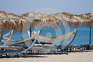 Sunbeds, Umbrellas and Hammocks in a beach