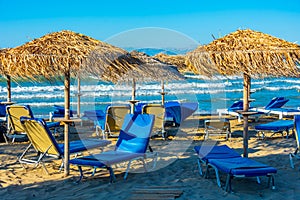 Sunbeds and umbrellas at Sidari beach at Corfu, Greece