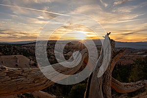 Sunburst Through Clouds over Mesa Behind Bryce