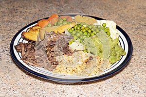 Sunday dinner of slow cooked shredded pulled beef