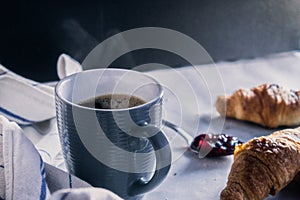 A sunday morning breakfast with croissants and coffee