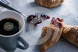 A sunday morning breakfast with croissants and coffee
