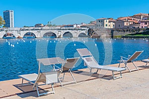 Sundeck overlooking Bridge of Tiberius (Ponte di Tiberio) in Rim