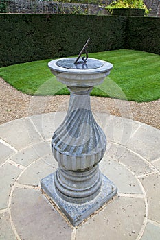 Sundial in a formal garden