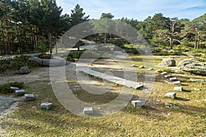 Sundial in the middle of the forest in Cercedilla, Madrid. Sierra de Guadarrama National Park, Spain photo