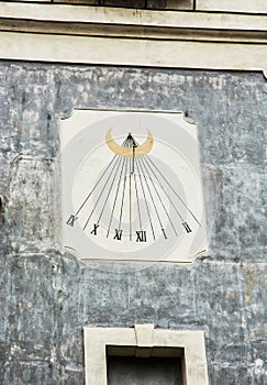 Sundial on the old wall, time measurement