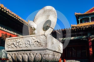 Sundial and palace in forbidden city