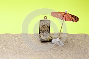 Sundial and umbrella beach