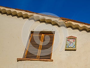 Sundial and window photo