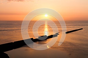 Sundown on Helgoland with wall into the sea