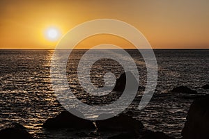 Sundown over the Altantic Ocean at Madeira coastline