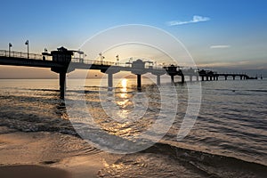 Sundown over pier in Miedzyzdroje, Poland