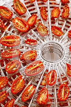 Sundried cherry tomatoes on food dehydrator