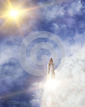 Sunflare and rocket. The elements of this image furnished by NASA photo