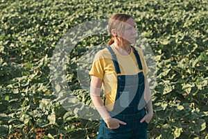 Sunflower farmer posing in field