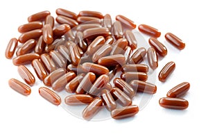 Sunflower lecithin in capsules on a white background.