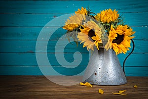 Sunflower in metal vase